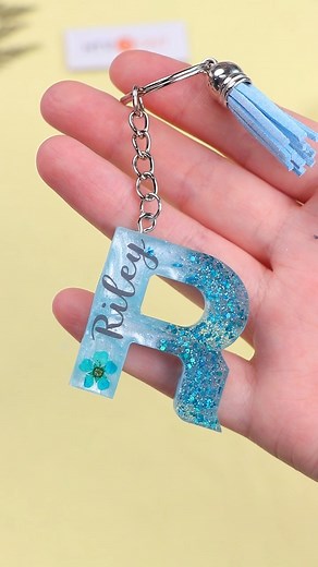 HTVRONT on Instagram: "Personalized Letter Keychain. Steps: 1.Pour the epoxy resin mixed with mica powder and glitter. 2.After curing, attach the adhesive name decal. 3.Pour UV resin and cure it with a UV lamp. #htvront ⁠#resinart #diykeychain #cricut #handmade #glitter #cricutmade #cricutcreated #craftvideo #customgifts #diygifts #resincrafts"