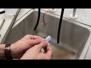 Preparing litmus paper test for ammonia gas