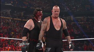 wwe raw 1000th undertaker returns to save kane