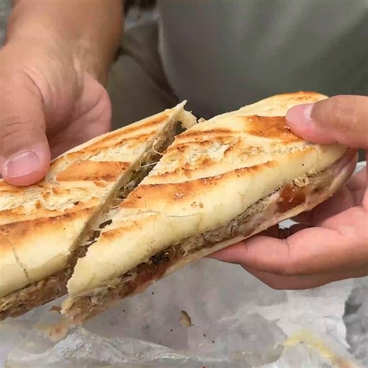 I’m in Miami, and this Cuban sandwich at Tinta y Cafe is easily one of the best I’ve had. Crispy pressed bread, flavorful pork, ham, melted cheese, and the perfect balance of mustard and pickles — it just works. If you’re eating your way through Miami, this is a must-try Cuban sandwich. #CubanSandwich #MiamiFood #MiamiEats #CubanFood | Strictly Dumpling