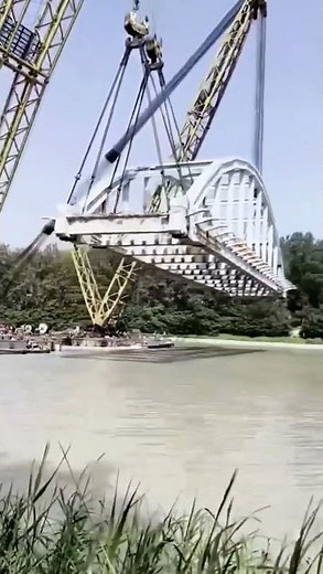 Erection of Steel Truss Bridges Using Barges