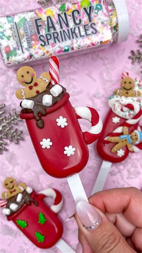 I repost these hit cocoa mug cakesicles every year because they’re one of my favorite cakesicle sets I ever made and I’ve loved seeing so many recreations of this set over the years. I think it’s time to remake them. I would leave out the fondant and use candy canes for the handles instead! They were filled with eggnog mousse and Pepperidge Farm gingerbread cookies. What do you think of them? #Christmas #cakesicles #ChristmasTreats #christmasbaking #holidaybaking #christmasinspiration #christmas