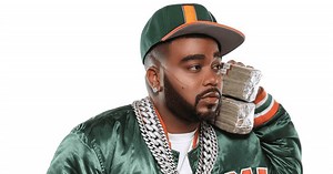 Pretty Ricky rapper Baby Blue in critical condition after being shot in armed robbery at bowling alley in Miami