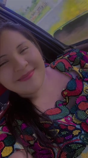 Vibrant Beaded Garments with Floral and Bird Patterns