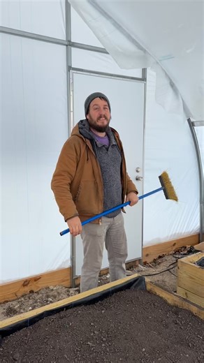 Snow will usually slide off your hoop on its own, but if there isn’t much warmth being held in your soils, it might want to stick! This is one method of getting an avalanche started. Just whack the plastic from the underside with a soft-bristled broom. Push brooms are great! | Nifty Hoops