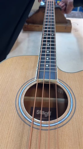 Stagg • Musical Instruments on Instagram: "🔧 Precision before the first note. Every @staggmusic SA40BASS ACE passes through our workshop for a final check before it leaves us. In this video, one of our luthiers is inspecting our new electro-acoustic bass, making sure everything is perfectly dialled in. With its spruce top, mahogany back and sides, and jumbo cutaway body, the SA40BASS ACE delivers a warm, full low-end both unplugged and amplified. The onboard preamp with chromatic tuner gives yo