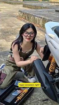 Now THIS is a real biker chick! 😎🔧 Step-by-step DIY scooter shock upgrade! #scootermods #diy