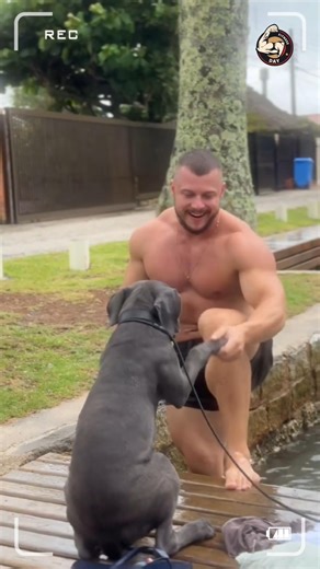 American Fitness Icon Roberti Swimming With His Dog | Strong Body, Strong Bond