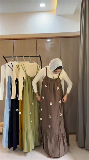 @ofa_bywafafahim on Instagram: "Sold Out🚫 The Meadow Crochet Pinafore Set Size : Free size up to Large Bring a touch of whimsical charm to your everyday style with our Meadow Crochet Pinafore Set. This two-piece ensemble features a breezy, crinkle-textured maxi dress adorned with handcrafted 3D crochet flowers and a flattering tiered hem. Designed for effortless layering, it comes complete with a soft, fitted long-sleeve ribbed top, providing a comfortable and modest silhouette that’s perfect f