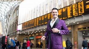 TikTok star Troy Hawke greets passengers at Kings Cross