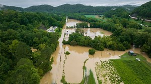 Strip mining worsened the severity of deadly Ky. floods, say former mining regulators.