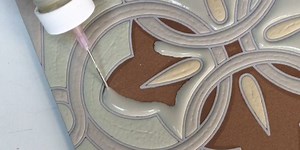 A company in California paints intricate tile designs by hand