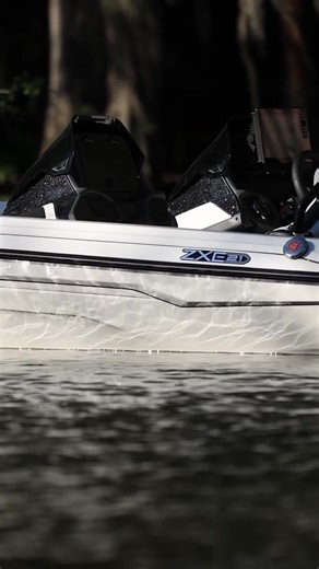 ZXE Standards and Options ⬇️⬇️⬇️ STANDARD FEATURES: ◼️Full Fiberglass Front Deck with Slam Latches ◼️8-Gauge Independent Electronic Wiring with 6 Position Fuse block, Console & Bow ◼️Cockpit Command Center with Mulit-Function Digital Gauges ◼️Two Bike Seats ◼️Increased Day Box with Electronics "Cabinet" ◼️Bolstered Full-Flex Sport Seating ◼️Stomp Trim Buttons ◼️Humminbird CMSI Xplore 12" at Console and 9" at Bow ◼️Minn Kota Ultrex 112 Trolling Motor ◼️Minn Kota 10 x 5 PCL Charger ◼️8’ Minn Kota 