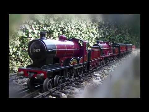 Bassett Lowke and Bing clockwork locomotives double heading an Exley train