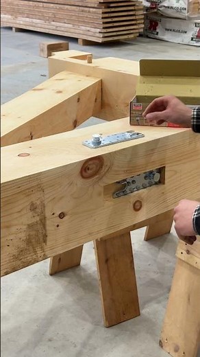 Staircase landing installation for an office walkway with concealed hangers. #woodworking