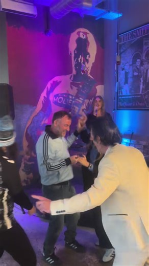 Vibrant Crowd Reaction to Live Music Performance