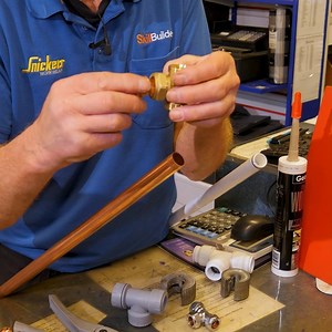 Roger shows us how to fit a Polyplumb Tee pipe fitting. #plumbing #pipework #diyhacks | Skill Builder