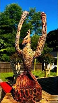 Watch the phoenix RISE from the sawdust! #carving #phoenix #shorts