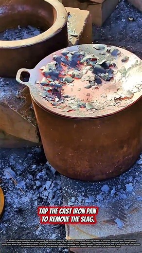 Tap the cast iron pan to remove the slag