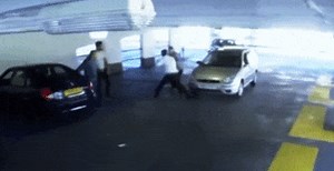 Parking Garage Accident Leads To Fist Fight, KO Ensues | Carscoops
