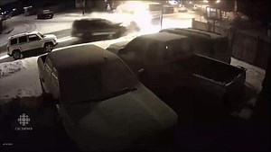 Calgary sanding truck plows into parked cars