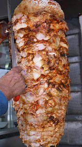 Download rotating traditional gyros meat close up for free