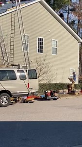 A ladder conveyor that moves supplies up to the roof. Saw this being used at my neighbor's yesterday and thought it was so cool I had to take a video.