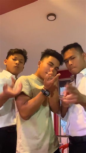 Coordinated Arm Dance by Young Adults