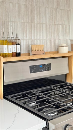 Ok…. Why didn’t we find this sooner! 👀 Free up counter space immediately 👏🏻 This over-the-stove rack adds storage right where you need it! Spices, oils, or utensils all within easy reach ✨ 🛍️ Comment “RACK” to get a DM or head to our Amazon Storefront Kitchen Organization folder to shop. Xx #founditonamazon #amazonhome #kitchenorganization over stove rack, small kitchen storage ideas, kitchen space saving hacks, countertop organization, kitchen organization upgrades, functional kitchen finds