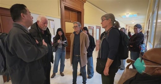 Retired firefighters confront insurance company rep over denial of cancer treatment for colleague