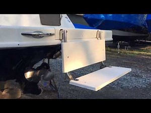 Swim Platform ULTRA installed on a Bayliner 2855 with brand new BUILT-IN RETRACTABLE BENCH!