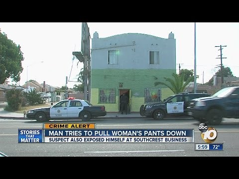 Man tries to pull woman's pants down