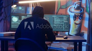 Hacker arriving in underground base, ready to do computer sabotage using encryption trojan ransomware. Cybercriminal starting hacking process, ransoming stolen data from victims, camera B