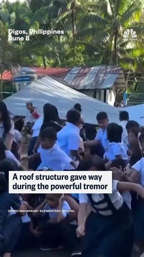 Students are rocked back and forth during 7.8-magnitude Philippines earthquake