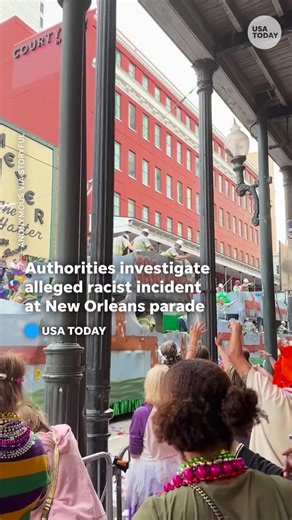 Authorities are investigating an alleged racist incident that took place at a New Orleans parade. An individual held beaded necklaces with two Black Barbie-like dolls dangling by their necks. | USA TODAY