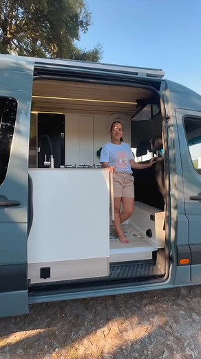 Custom Campervan Builds, Conversions & Offgrid Adventure Vans on Instagram: "This compact campervan proves that good things come in small packages! With an indoor shower, a clever mechanical bed over a dinette, a cozy kitchen, fridge, and plenty of storage—it's a tiny home that’s packed with big features. Plus, you can hop right into the driver’s seat from the living area. 🚐✨ What’s your favorite feature? Share your thoughts below! 🎥 by @project_dream_van #campervanhacks #vanlifeproject #vanli