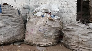 Bags of rag pickers filled with recycling waste material Stock Video