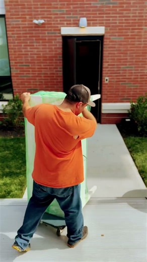 Unloading a Heavy Desk Made Easy with a Dolly