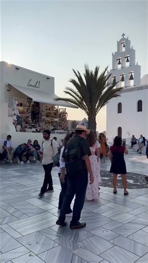 Oia Village Santorini: iconic bright blue church domes and whitewashed Aegean balconies 4K