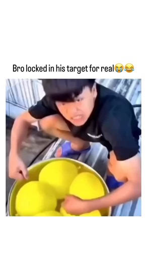 DailyReelX on Instagram: "Follow @DailyReelX Hit follow for daily chaos, laughs, and perfectly timed moments. It starts like a cartoon boss fight. One guy crouched beside a giant tub of bright yellow water balloons, loading up like it’s a serious mission. Focused. Silent. Ready to strike. Then the camera flips the script. Below him, his friend is literally trapped inside a drum, half-submerged in a shallow pool, trying to fight back with a single balloon at a time. Brave… but absolutely outmatch