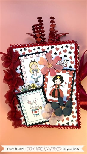 Ana ✂️ my.cat.and.crafts on Instagram: "Fell right down the rabbit hole with this mini album using @miquekascrap’s Kit Maravillas collection 🖤❤️ The Alice in Wonderland inspired theme collection is just toooooo cute, and it was so fun turning it into a fully interactive mini album. I added lots of frames, floral embellishments, and the adorable mini die cuts that come with the collection, plus tuck spots filled with tags, finished off with sweet little heart trims. Every page feels like a tiny 