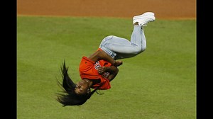 Simone Biles didn’t just throw the 1st pitch of Game 2 of the World Series — she flipped and twisted, too