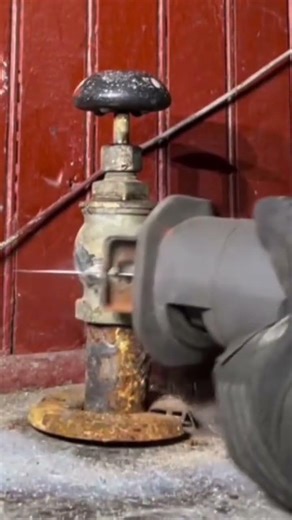 An iron material that is being cut and split using a cutting tool