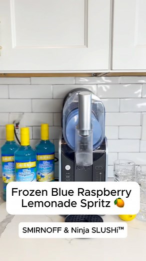 Ninja Kitchen on Instagram: "The summer of spritz. 🍋 Try this delish Frozen Blue Raspberry Lemonade Spritz. Made using @smirnoff Blue Raspberry Lemonade & the Ninja SLUSHi™. ☀️ Full recipe linked in our bio. #NinjaSLUSHi"