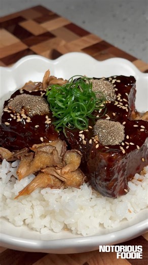 Soy-braised short ribs with white miso and truffle. The beef is slow-cooked in a soy-based braising liquid that will give everything you want in a single bowl: melt-in-the-mouth beef, a glossy, flavour-packed sauce, and the kind of aroma that makes people hover around the kitchen whilst you cook. There are layers of complexity to this one, from the deeply toasted aromatics of shallot, ginger, garlic and star anise; to the white miso and truffle worked in at the end for an earthy, luxurious finis