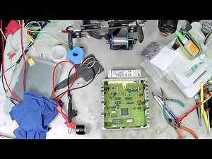 Automotive electronics repair on Ford F150 ECU fixing broken traces after capacitors leaked on pcb