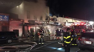 Queens 4-alarm fire sends smoke pouring out of building