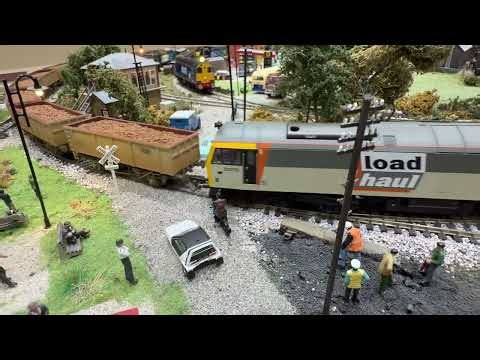 Invacar is passed by ore train.