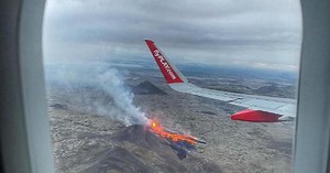 Caught on camera: Stunning view from a plane flying of erupting volcano in Iceland