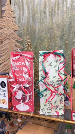 Holiday gifting made easy (and adorable!)🍷 Here’s how to dress up your wine in 30 seconds! These Christmas wine bags are available in store now, ready to make your gifts extra cute✨🎄 | The Brook Home & Gift